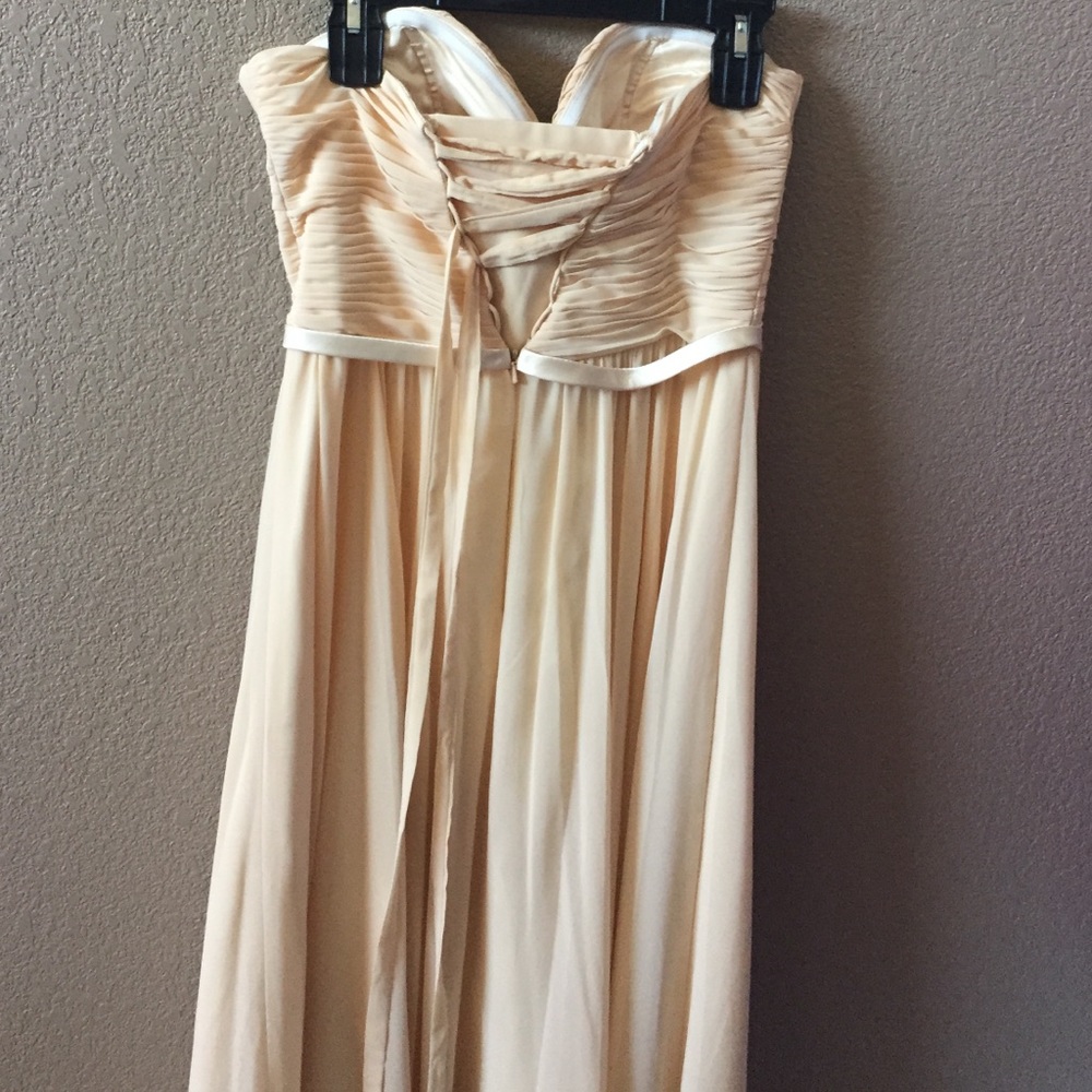 Strapless champagne peach formal with corset back